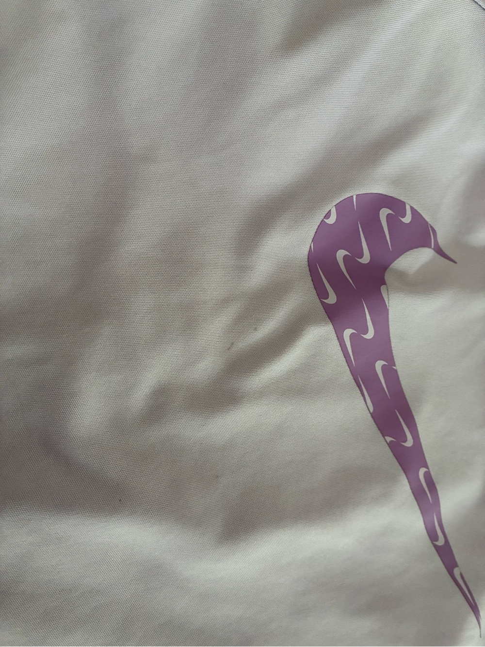 Nike White Shirt with Lavender Swoosh Graphic